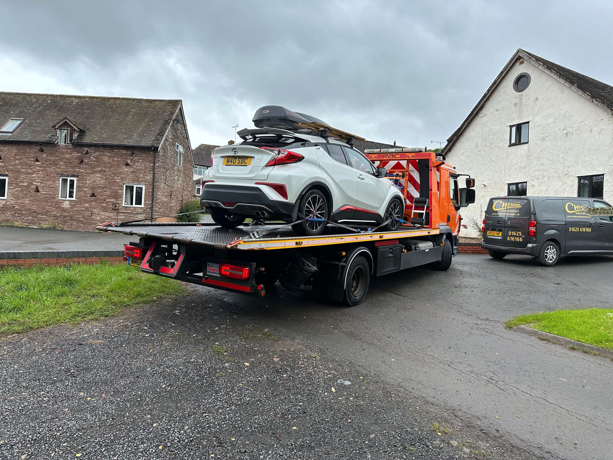 London car recovery team loading a vehicle on a recovery truck